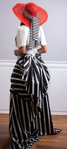 Renogra — Greek-inspired blouse with exaggerated Renaissance skirt and modernist hat