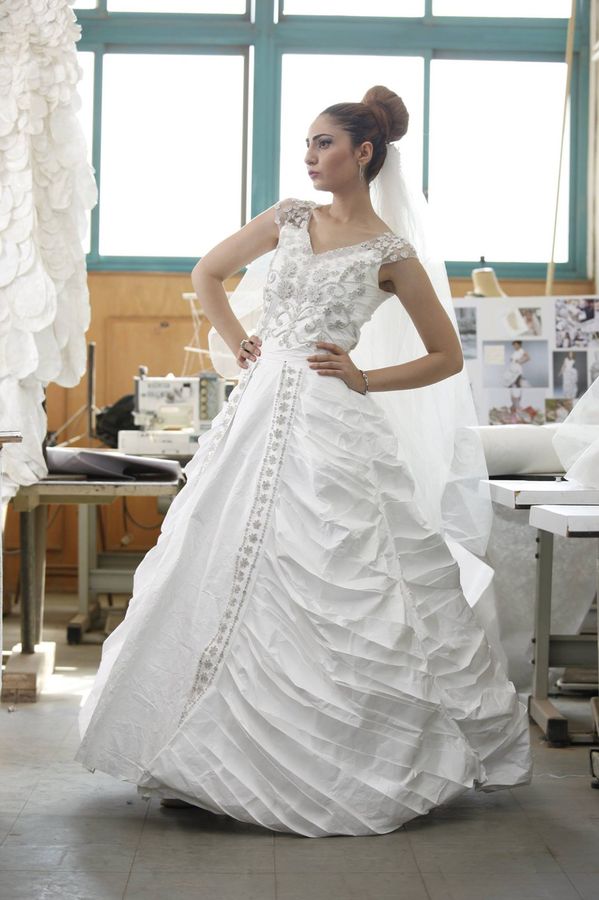 Quillora — bridal gown with intricate paper quilling