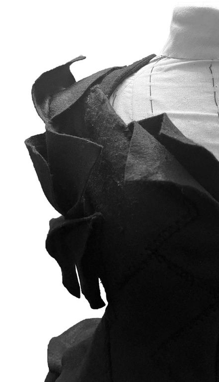 Close detail of garment shoulder construction